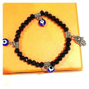 Evil eye and hamza protective hand bracelet